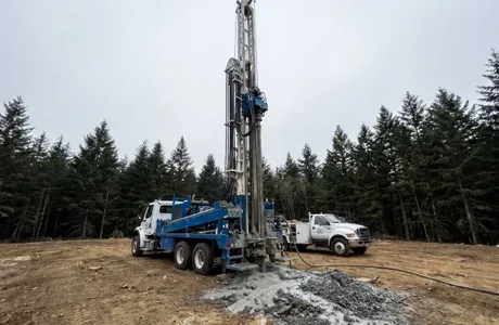 Well drilling rig at a rural property