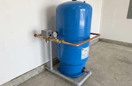 Water sample being collected for well testing